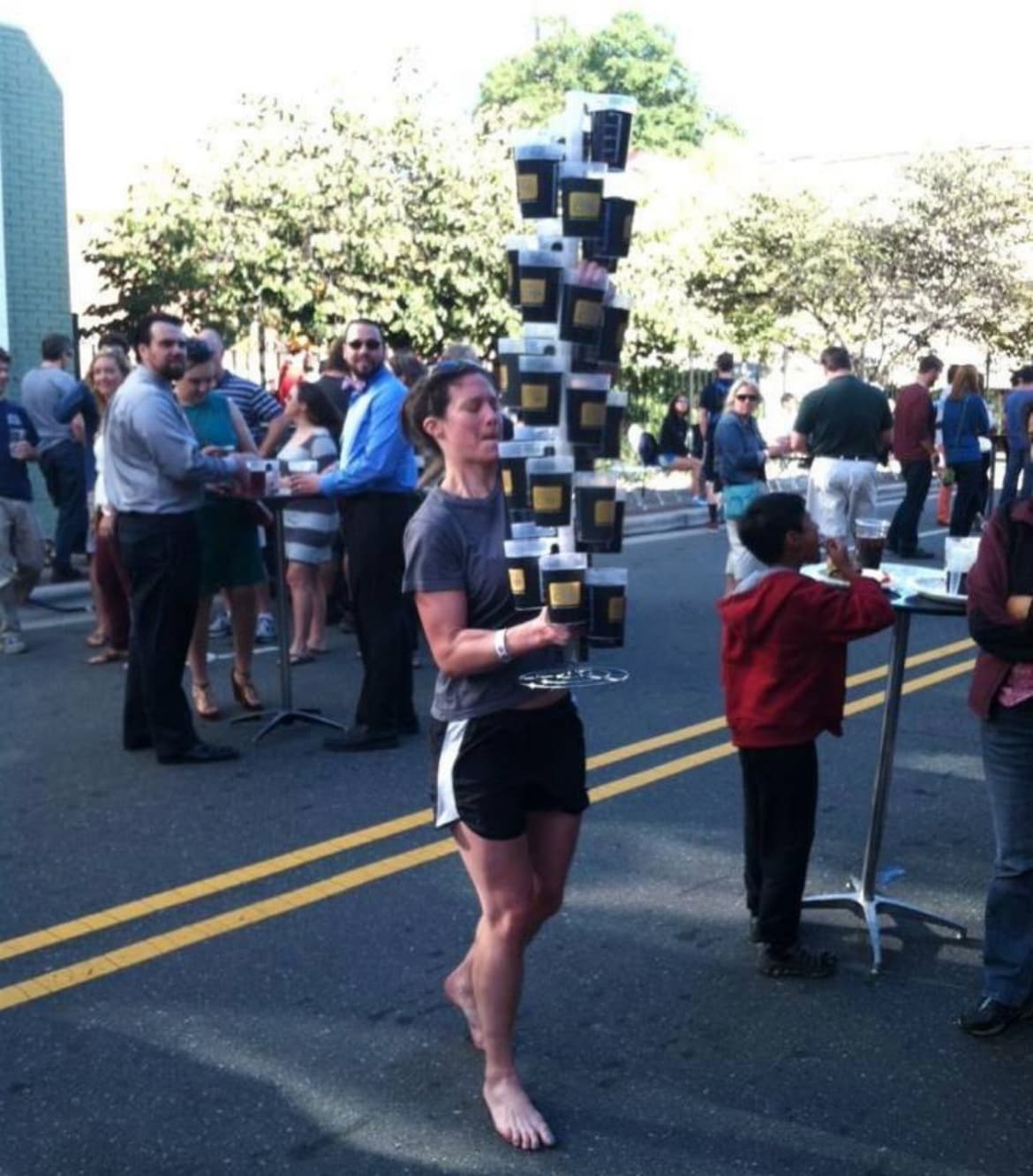 Festival goers returning reusable cups to a bar exchange point