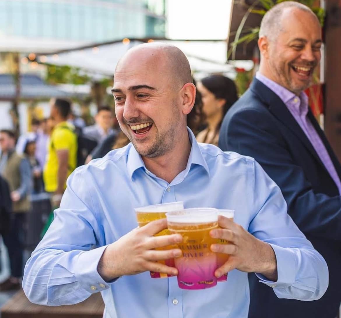Festival crowd with branded pint cups